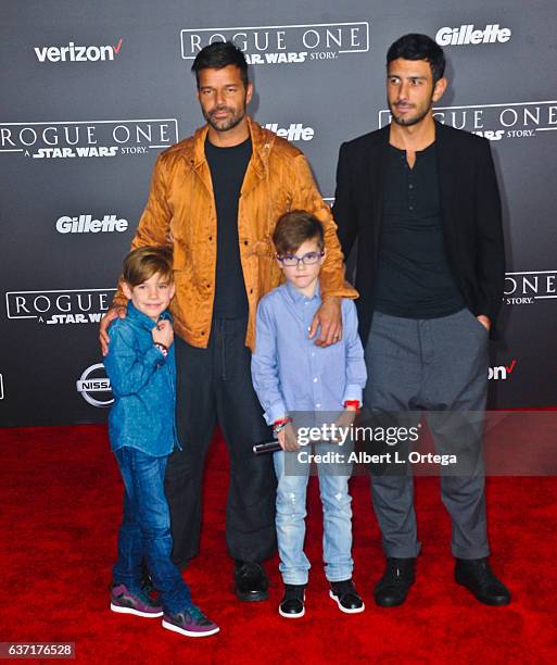 Recording Artist Ricky Martin, sons Matteo Martin and Valentino Martin and artist Jwan Yosef arrives for the Premiere Of Walt Disney Pictures And...