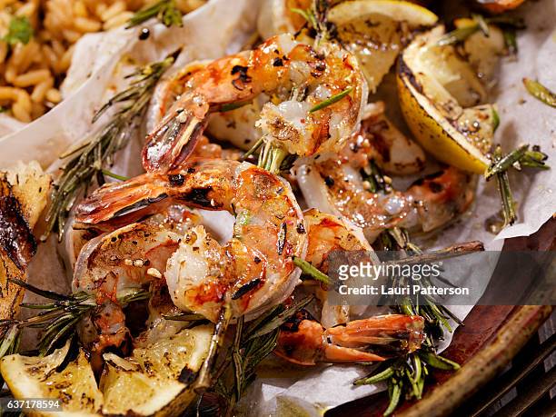 rosemary shrimp skewers - wild rice stock pictures, royalty-free photos & images