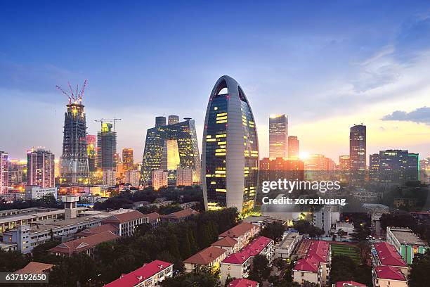 beijing city skyline and cctv headquarters, china - cctv headquarters stock pictures, royalty-free photos & images