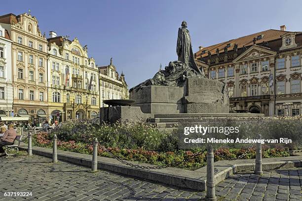 jan hus monument in the old town square of prague, czech republic. - mieneke andeweg stock pictures, royalty-free photos & images