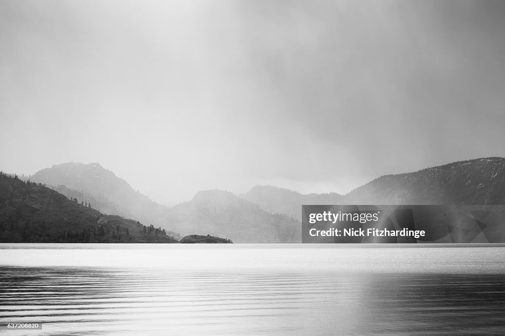 Rainshower over Okanagan Lake viewed from Peachland, Okanagan Valley, British Columbia, Canada