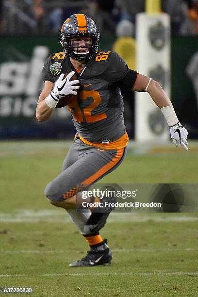 Ethan Wolf of the University of Tennessee Volunteers plays against the Nebraska Cornhuskers during the Franklin American Mortgage Music City Bowl at...