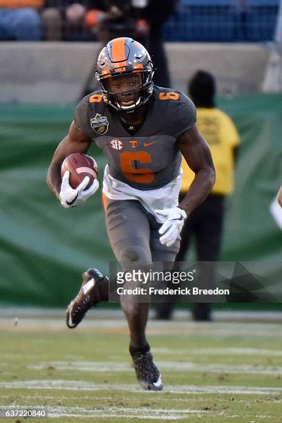 Alvin Kamara of the University of Tennessee Volunteers plays against the Nebraska Cornhuskers during the Franklin American Mortgage Music City Bowl...