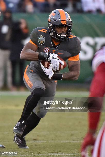John Kelly of the University of Tennessee Volunteers plays against the Nebraska Cornhuskers during the Franklin American Mortgage Music City Bowl at...