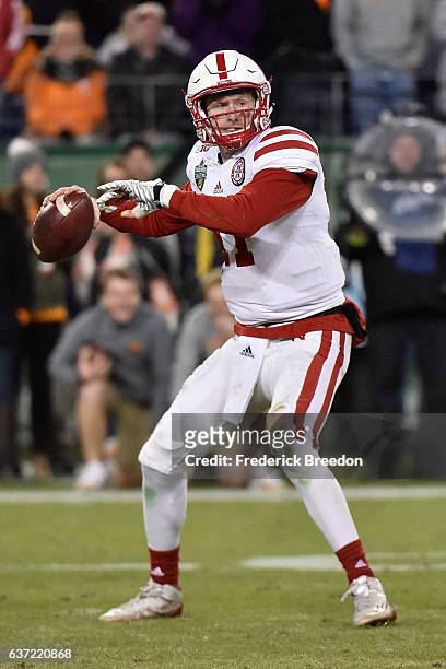 Quarterback Ryker Fyfe of the Nebraska Cornhuskers plays against the University of Tennessee Volunteers during the Franklin American Mortgage Music...