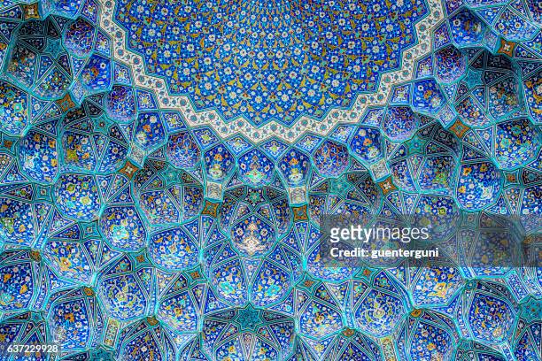 tilework at shah mosque on imam square, isfahan, iran - religion stockfoto's en -beelden