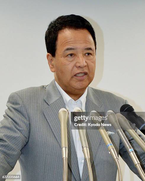 Japan - Economic and fiscal policy minister Akira Amari holds a press conference at the Cabinet Office in Tokyo after the country's gross domestic...