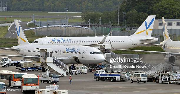Japan - Photo shows airplanes of Japanese budget carrier Vanilla Air at Narita airport near Tokyo on May 16, 2014. The airline will cancel a total of...