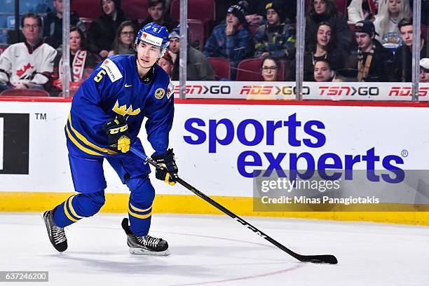 David Bernhardt of Team Sweden skates the puck during the 2017 IIHF World Junior Championship preliminary round game against Team Finland at the Bell...