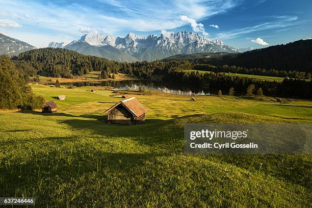 autumn at gerold lake - mittenwald stock pictures, royalty-free photos & images