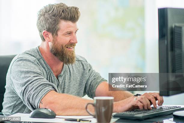 answering emails from a home office - rewards program stock pictures, royalty-free photos & images