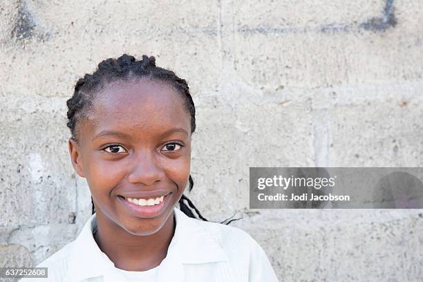 series:teenage honduran girl wearing white school uniform shirt - honduras children stock pictures, royalty-free photos & images