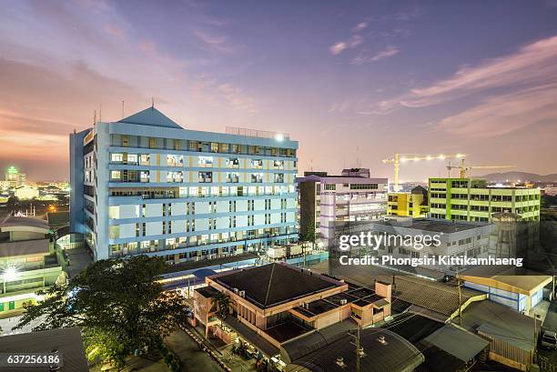 city view twilight of chonburi hospital - hospital building stock-fotos und bilder