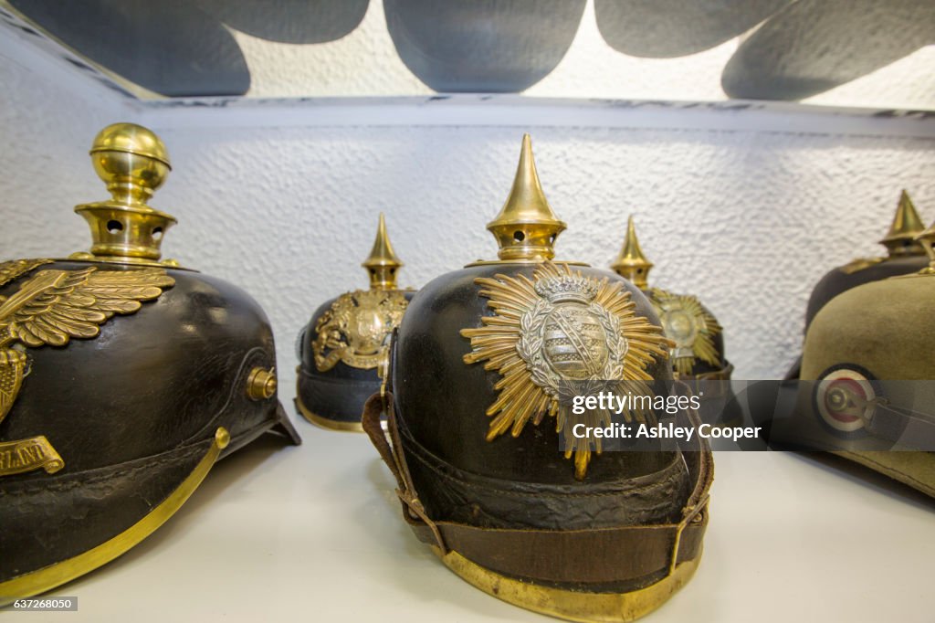 German helmets at the underground Battle of the Somme museum in Albert, which is in the ancient tunnels that were by the townsfolk to shelter during the war, France.