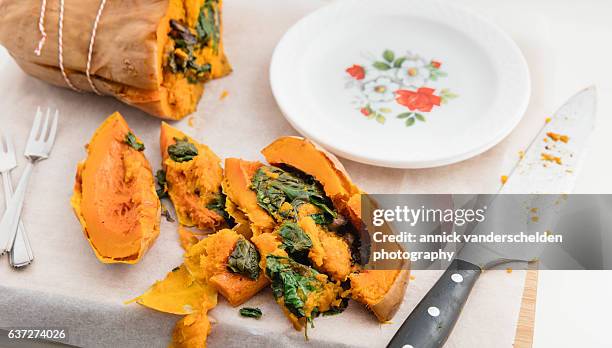 oven-baked butternut pumpkin. - fruit flesh stock pictures, royalty-free photos & images