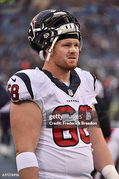 Tony Bergstrom of the Houston Texans watches from the sideline during a game against the Tennessee Titans at Nissan Stadium on January 1, 2017 in...