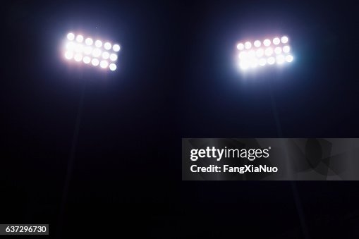View of stadium lights at night View of stadium lights at night