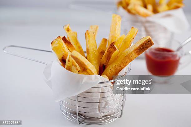 hand-cut french fries - carolafink stock pictures, royalty-free photos & images