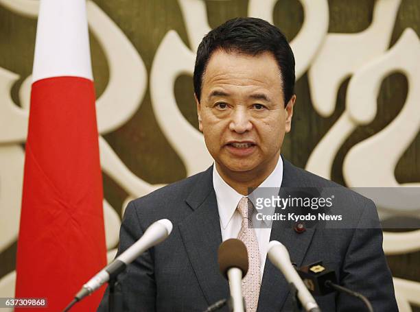 Singapore - Akira Amari, Japan's minister in charge of the Trans-Pacific Partnership free trade talks, speaks at a press conference after the closing...