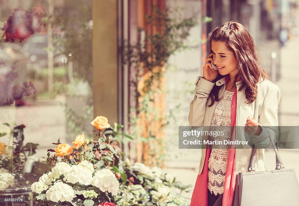 Woman enjoying the flowers