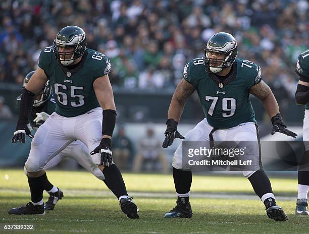 Lane Johnson and Brandon Brooks of the Philadelphia Eagles block against the Dallas Cowboys at Lincoln Financial Field on January 1, 2017 in...