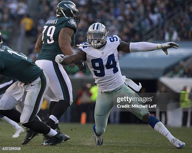 Randy Gregory of the Dallas Cowboys runs around Brandon Brooks of the Philadelphia Eagles at Lincoln Financial Field on January 1, 2017 in...