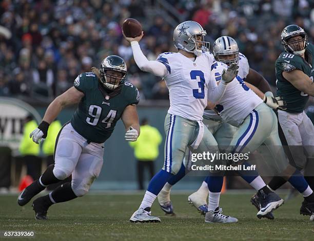 Mark Sanchez of the Dallas Cowboys passes the ball in the third quarter against Beau Allen of the Philadelphia Eagles in the third quarter at Lincoln...