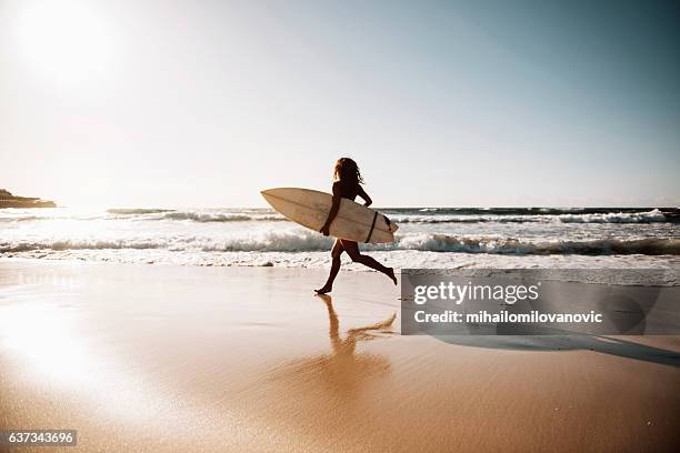 let's go surfing! - woman surfing stock pictures, royalty-free photos & images