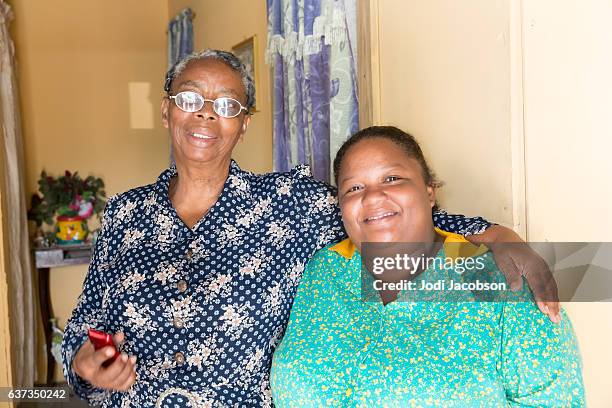 series:honduran woman in her home with mother in law - honduras people stock pictures, royalty-free photos & images