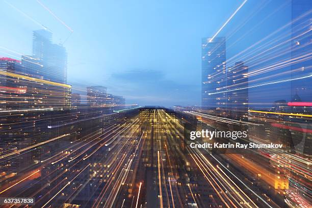 astro projection. light speed of modern cityscapes - inzoomen stockfoto's en -beelden