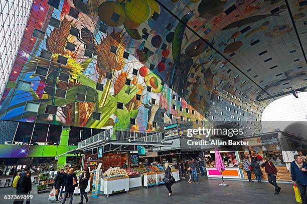 interior of rotterdam's markthal market hall - markthal stock-fotos und bilder