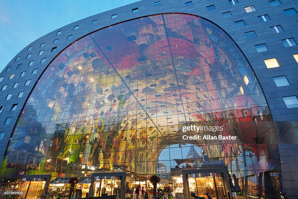 Facade of Markthal Market Hall at dusk