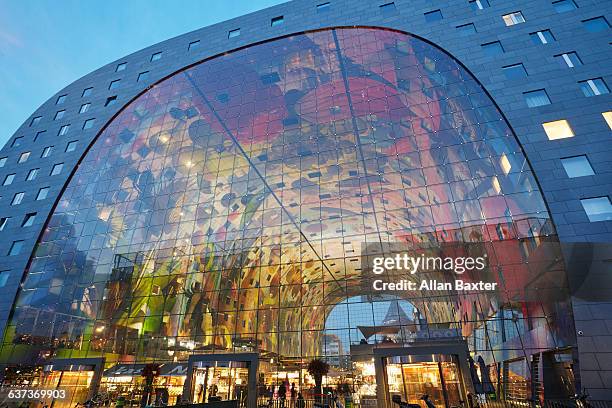 facade of markthal market hall at dusk - rotterdam market stock pictures, royalty-free photos & images