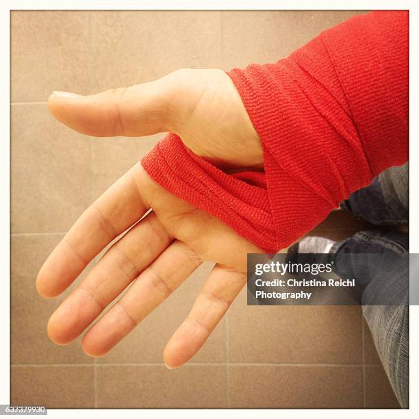 hurt hand in bandage - elastic bandage stock pictures, royalty-free photos & images