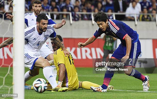 Japan - Atsuto Uchida of Japan scores a goal during the first half of an international friendly soccer game against Cyprus at Saitama Stadium 2002 on...