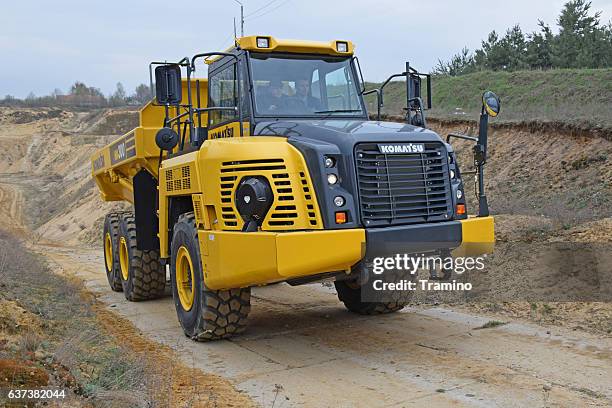 komatsu hm300 on the road - 6x6 stock pictures, royalty-free photos & images