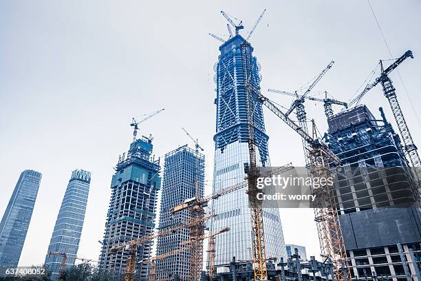 obras de construcción en beijing guomao - rascacielos fotografías e imágenes de stock