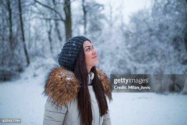 she loves the first snowfall - catching snowflakes stock pictures, royalty-free photos & images