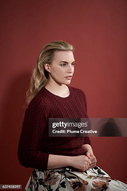Voluptuous woman in a red jumper