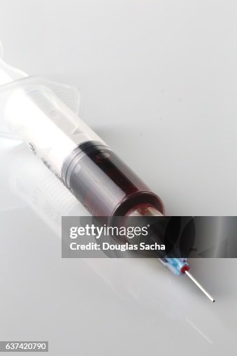 Full Syringe Of Intramuscular B12 Injection High-Res Stock Photo