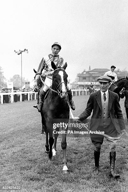 Never Say Die, with Lester Piggott up, is led in after winning The Derby