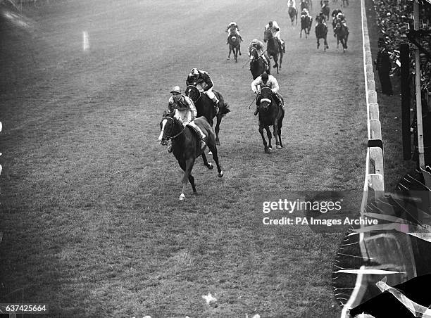 Never Say Die, with Lester Piggott up, comes home to win The Derby from Adrian Night and Darius