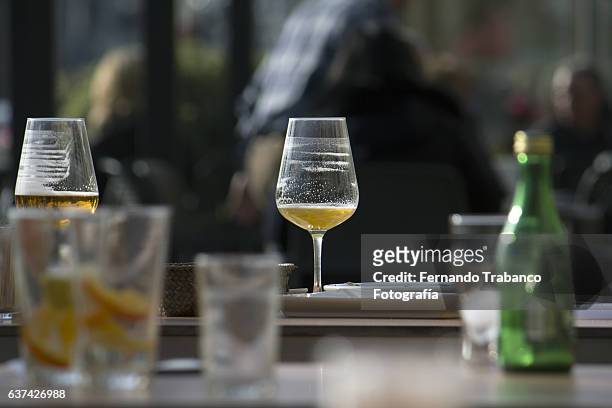 beer and cocktail glasses on a table - table after party stock pictures, royalty-free photos & images