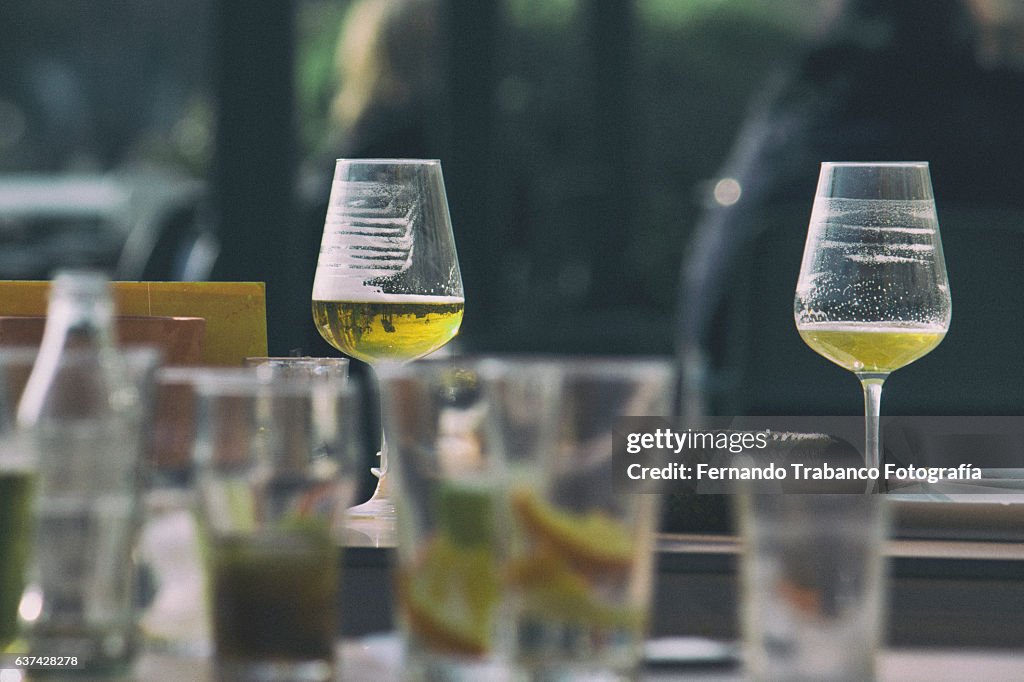 Beer and cocktail glasses on a table