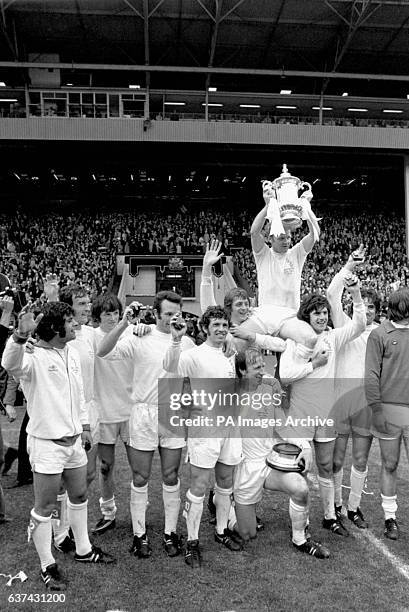 Leeds United celebrate with the trophy after their 1-0 victory: Mick Bates, Paul Madeley, Eddie Gray, Paul Reaney, Johnny Giles, Allan Clarke, Jack...