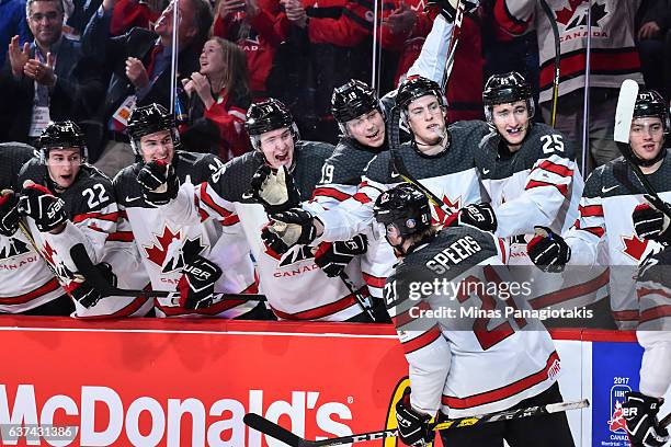 Blake Speers of Team Canada celebrates his goal with teammates on the bench during the 2017 IIHF World Junior Championship quarterfinal game against...