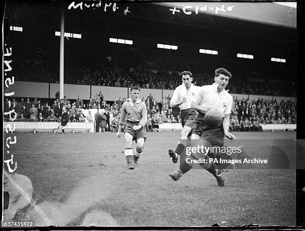 Tottenham Hotspur's Alex Wright passes the ball past clubmate Harry Clarke during a pre-season practice match