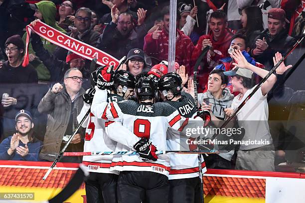Team Canada celebrates a goal in the second period during the 2017 IIHF World Junior Championship quarterfinal game against Team Czech Republic at...