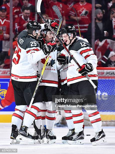 Team Canada celebrates a goal during the 2017 IIHF World Junior Championship quarterfinal game against Team Czech Republic at the Bell Centre on...