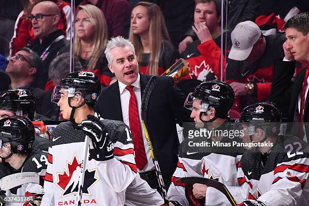 Head coach Dominique Ducharme of Team Canada calls out instructions to his team during the 2017 IIHF World Junior Championship quarterfinal game...